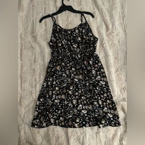 Large Dress. Thin cool fabric with pockets. Just a dress, no shorts under.